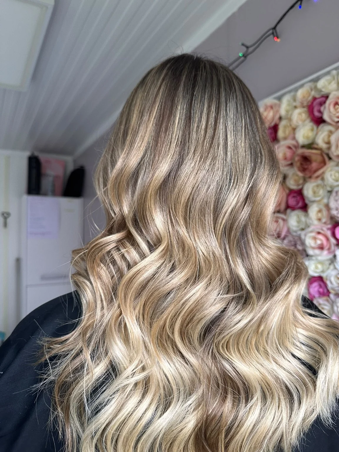 Blonde hair with soft waves, styled at Hair at Number 9